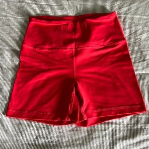 Neon red/orange biker shorts. 90 degree by reflex. Worn once.